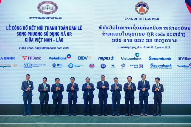 Viet Nam, Laos launch cross-border QR payment service - Ảnh 1. Viet Nam, Laos launch cross-border QR payment service - Ảnh 1.
