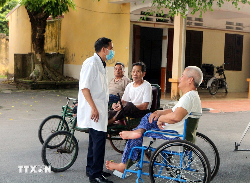 Chủ tịch nước: Chính sách ưu đãi người có công là nhiệm vụ thường xuyên, lâu dài Thương, bệnh binh coi trung tâm Điều dưỡng Thương binh Duy Tiên như là nhà, cán bộ, nhân viên trung tâm như người thân. (Ảnh: Nguyễn Chinh/TTXVN)